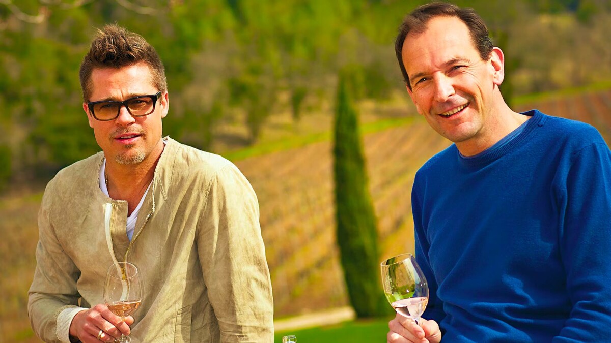 Brad Pitt sitting on the fence atChâteau Miraval