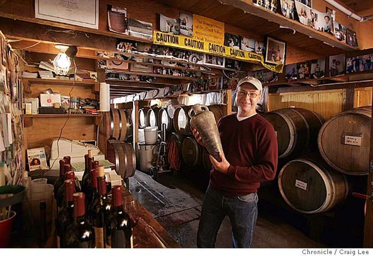 Winemaker making wine in his garage 